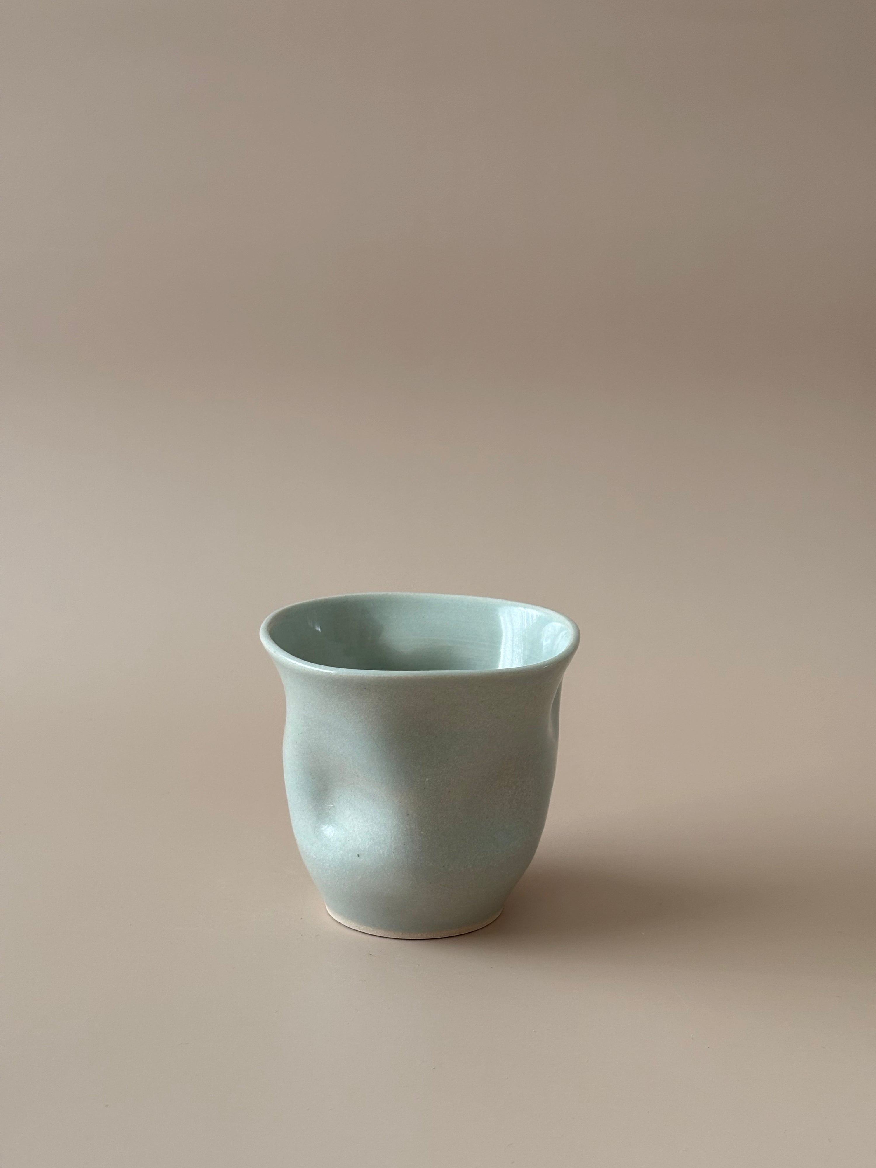 Wavy Cup in Water Ripples