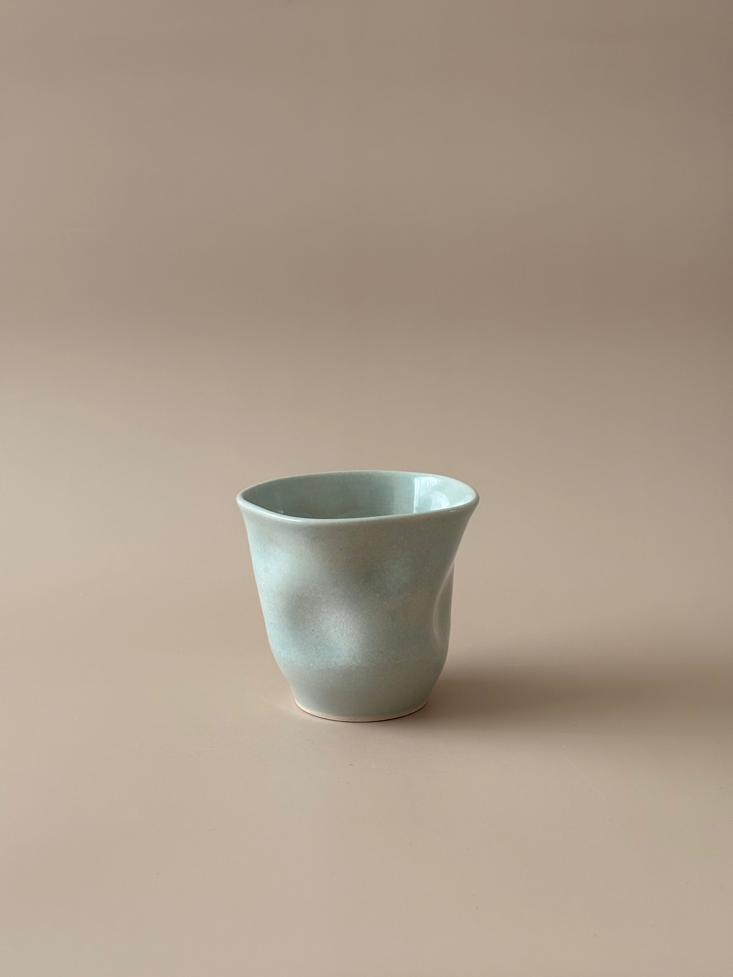 Wavy Cup in Water Ripples